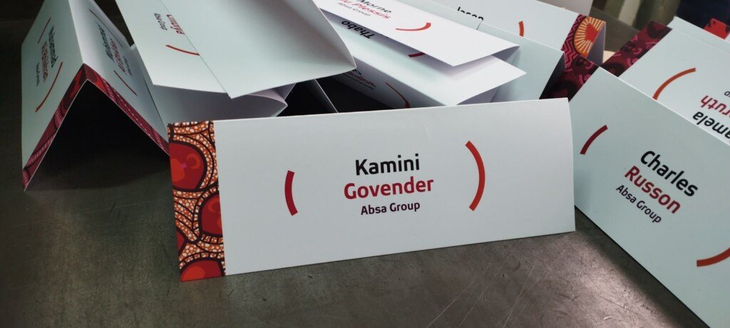 Custom seating plan board showing guest names and table numbers for an event in Nairobi