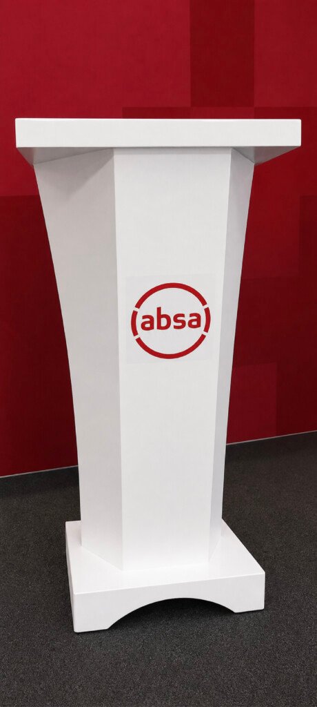 Custom-branded event podium displaying a company logo in Nairobi, Kenya