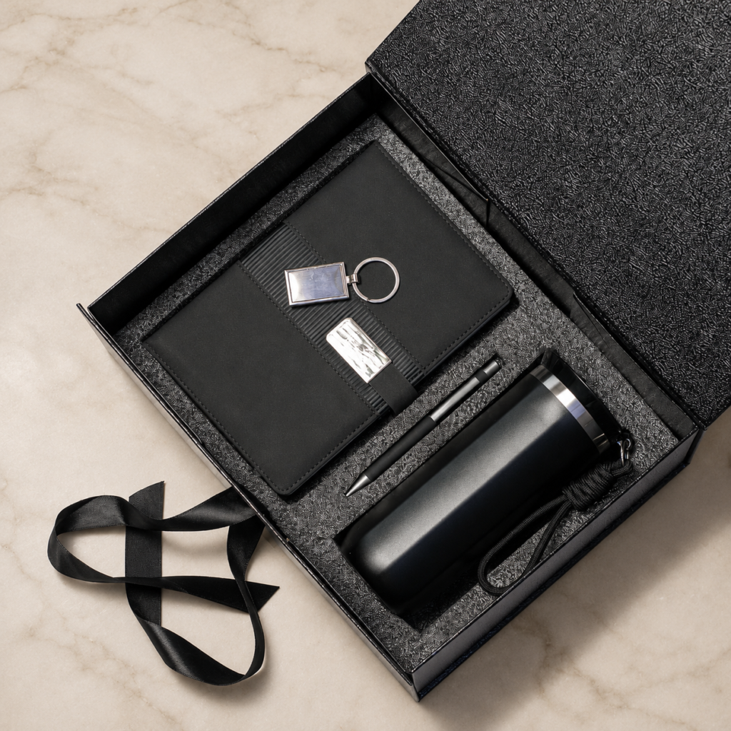 Notebook, pen, keyring and tumbler in a presentation box