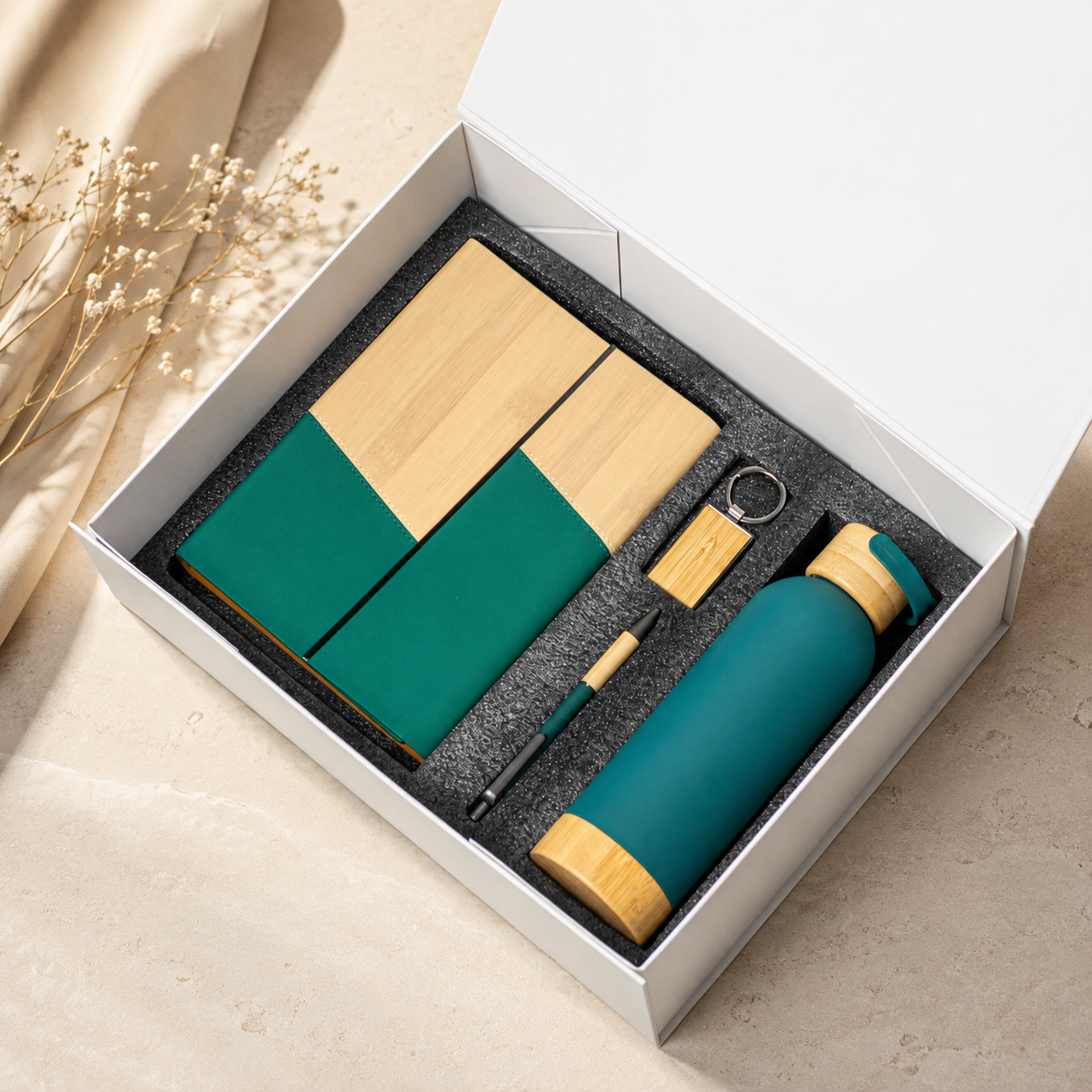 Two-tone notebook, pen, keyring and wood-accent bottle in a gift box