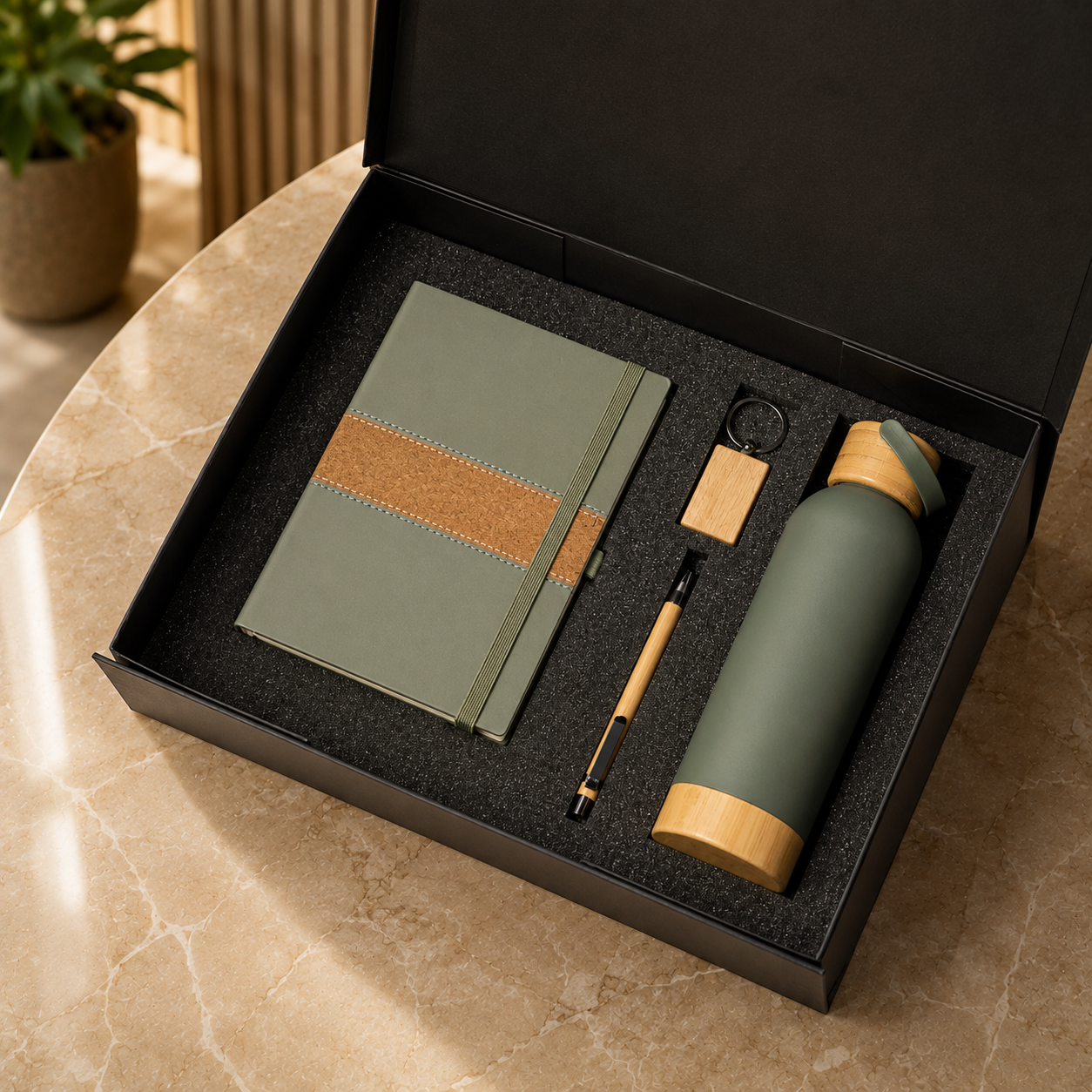 Wood-accent notebook, pen, keyring and matching bottle in a gift box
