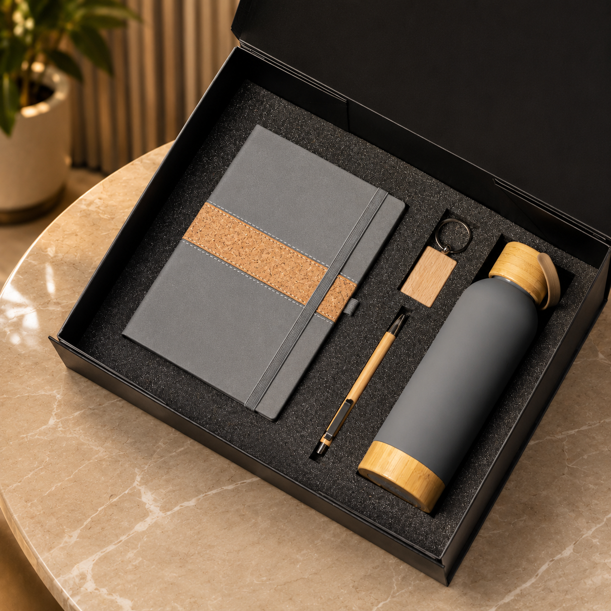 Wood-accent notebook, pen, keyring and matching bottle in a gift box