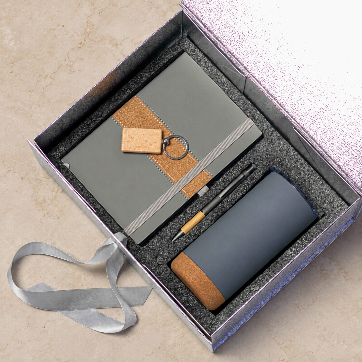 Notebook, pen, keyring and cork-base tumbler in a gift box