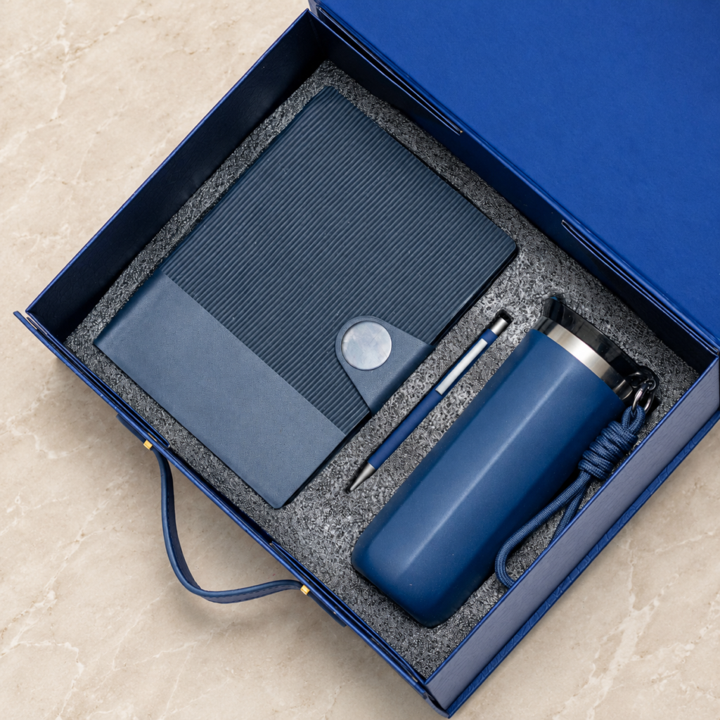 Round-buckle notebook, pen and flask in a presentation box
