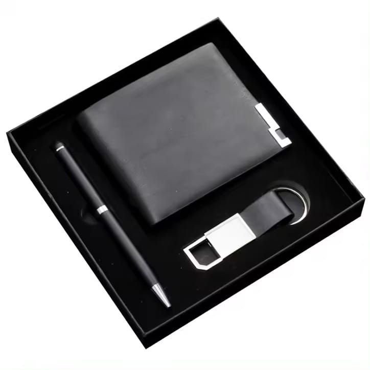 Black bifold wallet, pen and keyring in a black presentation box on white
