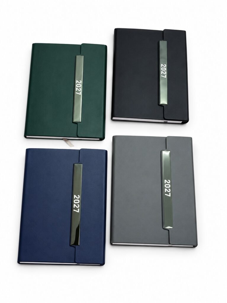 Four colours of A5 2027 diary design 564 with long vertical year strips on white