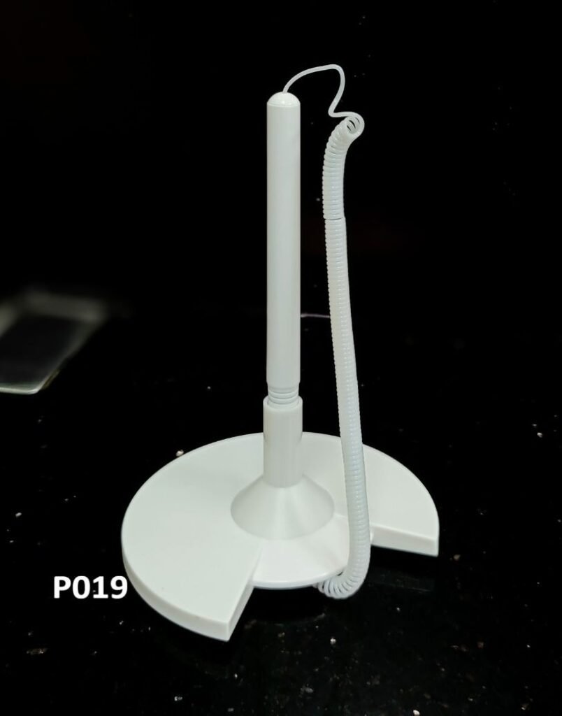 Tethered counter pen; Standing base with card-slot detail